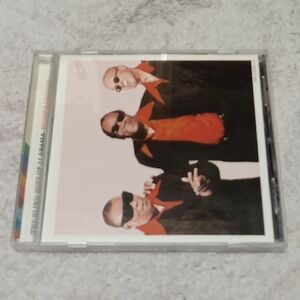 CD Album with Red and Black Cover Art